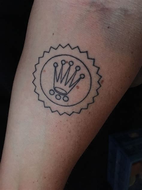 tatuaje de corona de rolex